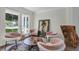 Cozy living room with plush seating and plenty of natural light at 8430 Woburn Ct, Windermere, FL 34786