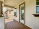 Inviting outdoor balcony, wood floors and view of neighboring building at 8491 Pippen Dr, Orlando, FL 32836