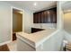 A modern bar area with dark cabinets and light countertops at 8491 Pippen Dr, Orlando, FL 32836