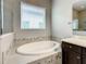 Elegant bathroom featuring a large soaking tub with decorative tile surround at 8491 Pippen Dr, Orlando, FL 32836
