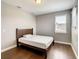 Bright bedroom with hardwood floors and a window providing natural light at 8491 Pippen Dr, Orlando, FL 32836