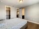 Cozy bedroom showing the closet and bathroom entrance at 8491 Pippen Dr, Orlando, FL 32836