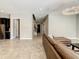 Spacious and bright interior view of a home showcasing an open floor plan and neutral color palette at 8491 Pippen Dr, Orlando, FL 32836