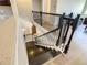 Staircase with rod iron railing at 8491 Pippen Dr, Orlando, FL 32836