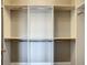 Spacious walk-in closet with custom shelving and ample hanging space at 8491 Pippen Dr, Orlando, FL 32836