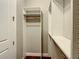 Well-organized walk-in closet with shelves and hanging space, conveniently located near the bedroom at 8491 Pippen Dr, Orlando, FL 32836
