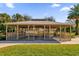 Community gazebo with picnic tables, providing a shaded area for outdoor gatherings at 8500 Iron Mountain Trl, Windermere, FL 34786