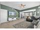 Open-concept living area flowing into a modern kitchen, perfect for entertaining guests at 8500 Iron Mountain Trl, Windermere, FL 34786