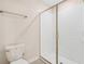 Clean and bright bathroom with modern shower and toilet at 8807 Interlocking Ct, Davenport, FL 33896