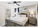 Cozy bedroom featuring a large bed, soft lighting, and calming decor at 8807 Interlocking Ct, Davenport, FL 33896