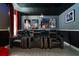 Enjoy movie nights in this cozy theater room, complete with reclining seats and a projector at 8807 Interlocking Ct, Davenport, FL 33896