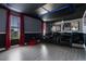Home theater with tiered seating, movie posters, and a starry ceiling for immersive entertainment at 8807 Interlocking Ct, Davenport, FL 33896