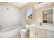 Bathroom with tub and single vanity at 9141 Camden Gardens St, Orlando, FL 32827