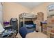 Bedroom with bunk bed and home gym equipment at 9141 Camden Gardens St, Orlando, FL 32827