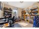 Study room with a window, carpet, and a lot of book shelfs at 9141 Camden Gardens St, Orlando, FL 32827