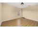 Cozy bedroom with hard wood floors and a single window at 9141 Camden Gardens St, Orlando, FL 32827