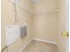 This walk-in closet features wire shelving and ample storage at 9141 Camden Gardens St, Orlando, FL 32827