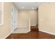 Welcoming foyer with tile flooring, staircase, and ample natural light, offering a warm entrance at 9141 Camden Gardens St, Orlando, FL 32827