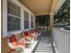 Relaxing front porch with comfortable seating, perfect for enjoying the serene surroundings at 9141 Camden Gardens St, Orlando, FL 32827