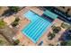 Aerial view of a community swimming pool with multiple lanes and surrounding lounge chairs at 9141 Camden Gardens St, Orlando, FL 32827