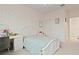 Comfortable bedroom with natural light, and cozy furnishings at 9845 Emerald Berry Dr, Winter Garden, FL 34787