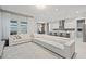 Expansive open-concept living room with view of kitchen and dining areas at 9845 Emerald Berry Dr, Winter Garden, FL 34787