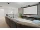 A cozy loft featuring a large screen, comfortable seating, and unique decorative touches at 9845 Emerald Berry Dr, Winter Garden, FL 34787