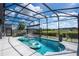 A screened pool featuring ample patio space and a view of the backyard at 9845 Emerald Berry Dr, Winter Garden, FL 34787