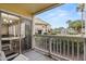 Relaxing balcony with scenic views of the community, sliding glass doors to the interior at 1031 S Hiawassee Rd # 2517, Orlando, FL 32835