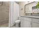 Stylish bathroom with modern vanity, updated shower, and contemporary mirror and accents at 1031 S Hiawassee Rd # 2517, Orlando, FL 32835