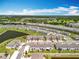 New townhome community boasts lush landscaping, and convenient highway access at 1045 Desert Candle Dr, Ocoee, FL 34761