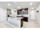 Bright, modern kitchen with granite countertops, stainless steel appliances, and a center island at 1045 Desert Candle Dr, Ocoee, FL 34761