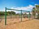 Spend time on the community swing set with wood chip ground covering at 1045 Desert Candle Dr, Ocoee, FL 34761