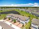 Charming townhomes feature brick-paved driveways, attached garages, and well-maintained landscaping, creating a welcoming curb appeal at 1045 Desert Candle Dr, Ocoee, FL 34761