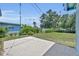 Backyard featuring concrete patio and lovely lawn at 1120 Courtland St, Orlando, FL 32804
