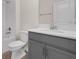 Well-lit bathroom showcases vanity and bathtub with tiled shower at 11258 Whistling Pine Way, Orlando, FL 32832
