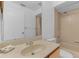 Bathroom featuring tiled floors, light colored walls, and a bath tub shower combo at 1156 Lucaya Cir, Orlando, FL 32824