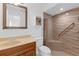 Bathroom features a shower with glass door and built in seat at 1156 Lucaya Cir, Orlando, FL 32824