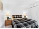 Bedroom featuring tiled floors, light colored walls, and closet with sliding doors at 1156 Lucaya Cir, Orlando, FL 32824