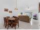 Open concept living and dining area filled with natural light at 1156 Lucaya Cir, Orlando, FL 32824