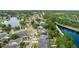 Aerial view of the neighborhood with houses and a lake, showcasing the beautiful location at 12952 Downstream Cir, Orlando, FL 32828