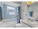 Bathroom featuring a bath and shower combination at 12952 Downstream Cir, Orlando, FL 32828