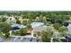 Aerial view of neighborhood amenities: pool, playground, tennis courts, and clubhouse at 12952 Downstream Cir, Orlando, FL 32828
