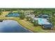 Aerial view of the community pool, tennis courts, and playground at 12952 Downstream Cir, Orlando, FL 32828