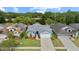 Inviting single Gathering home with a well-manicured lawn and attached two car garage at 12952 Downstream Cir, Orlando, FL 32828