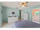 Main bedroom with en-suite bathroom, and tile flooring at 12952 Downstream Cir, Orlando, FL 32828