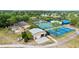 Aerial view of the multiple tennis courts and playground for community members at 12952 Downstream Cir, Orlando, FL 32828