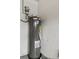 Durable water heater with brick walls, ensuring reliable hot water for the home at 12952 Downstream Cir, Orlando, FL 32828