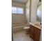 Vacant bathroom with a combo shower and tub with tile surround at 13543 Emeraldview Dr, Orlando, FL 32828
