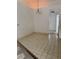 Vacant dining room with tile floors and basic light fixture at 13543 Emeraldview Dr, Orlando, FL 32828